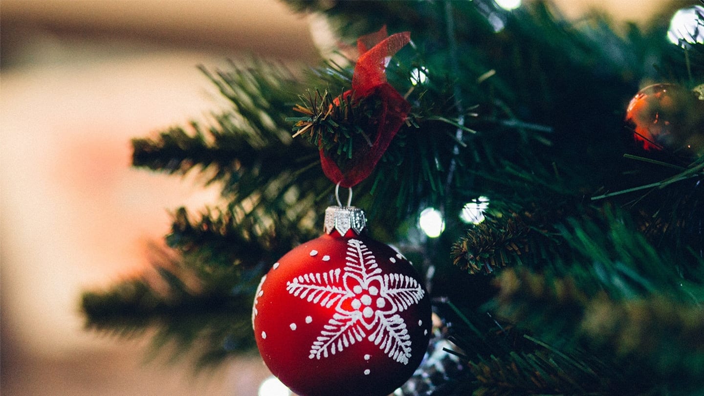 red bauble on christmas tree