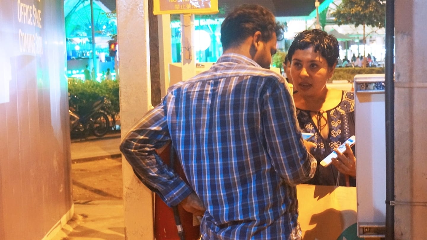 indian woman and indian man having a conversation