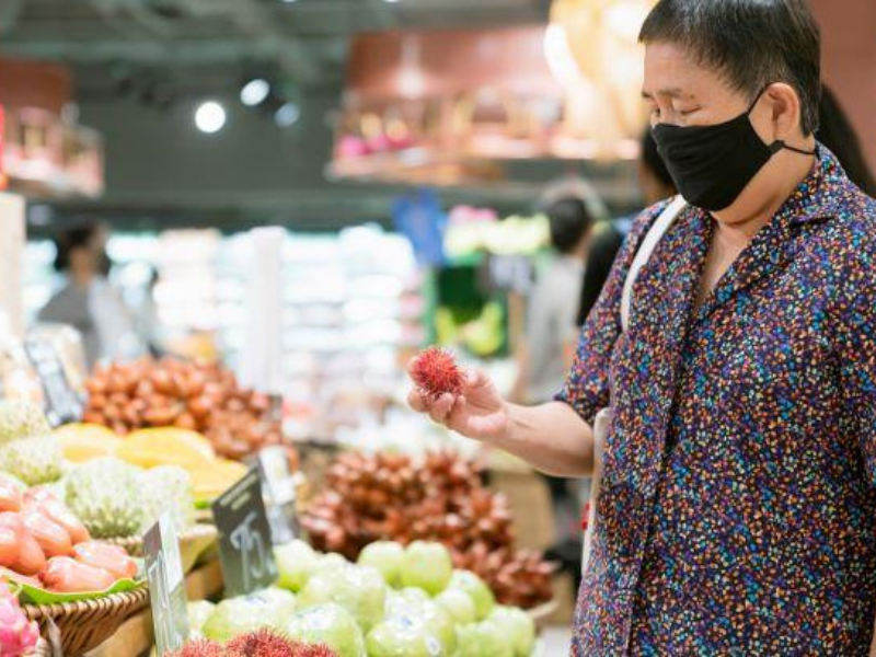 Elderly buying groceries