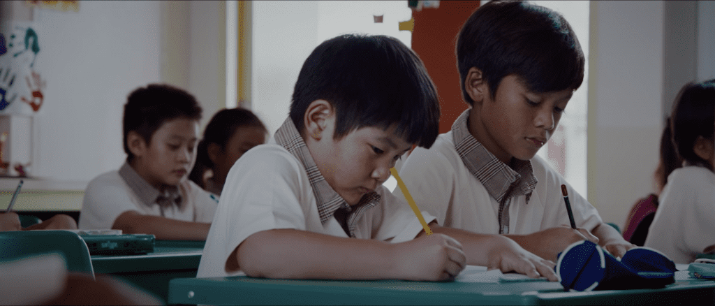 Boys engaged in classroom learning