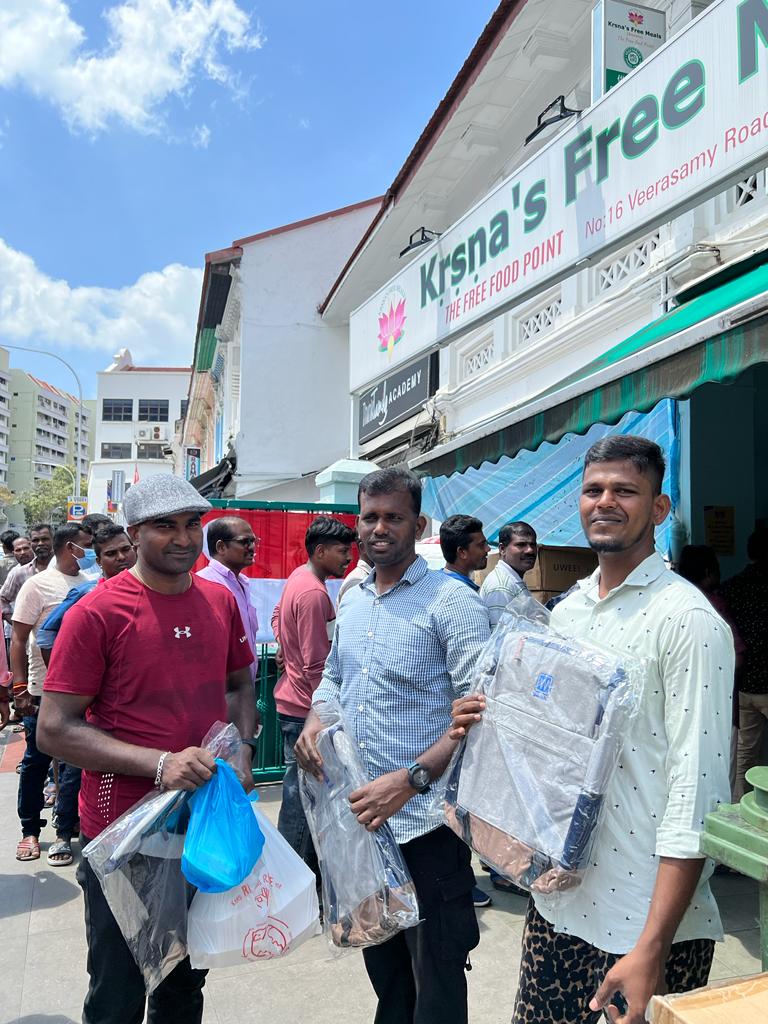 Krsna's Free Meals giving out gifts to migrant workers