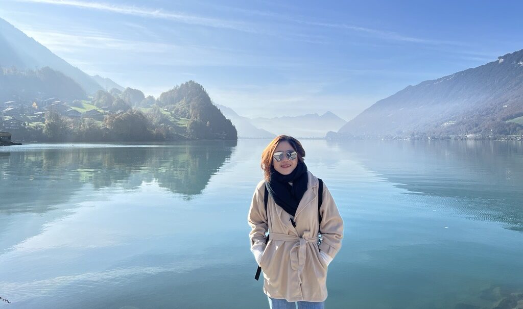 a woman posting for a photo in Iseltwald