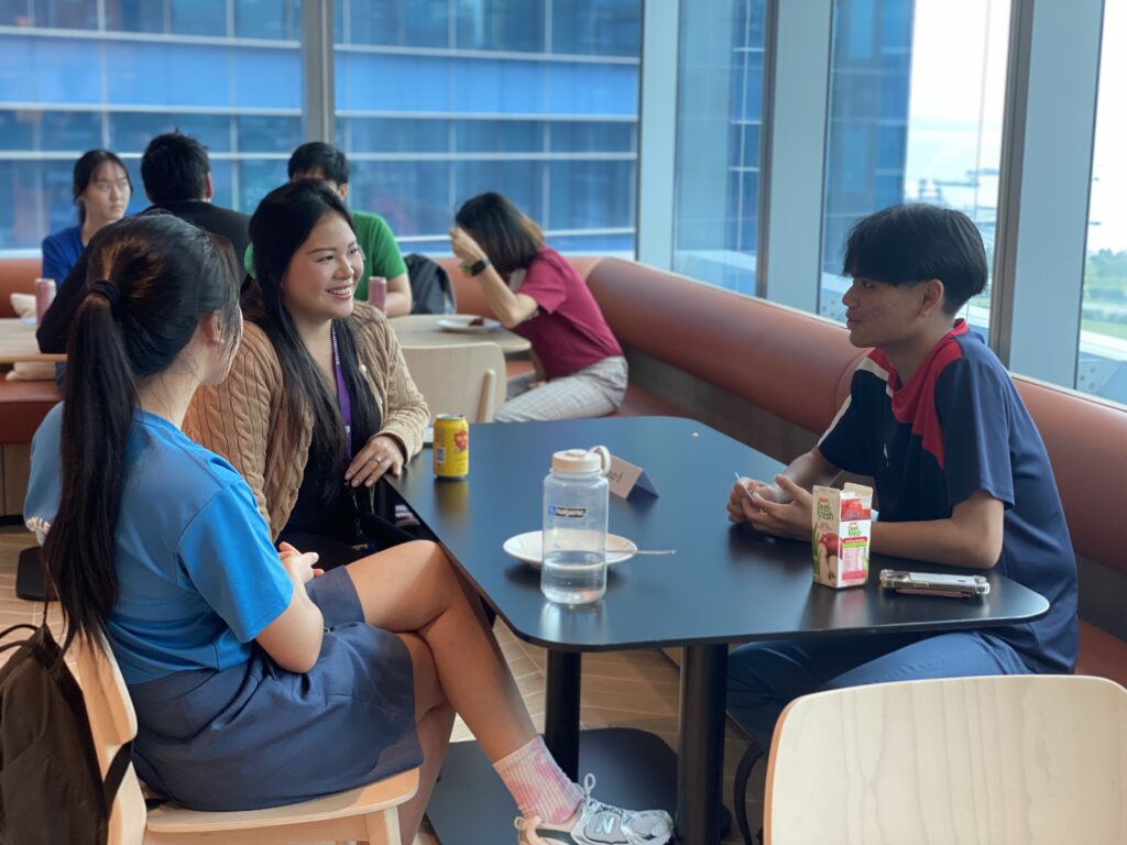 Recognising a Leader of Good: Why I Nominated Clarence for the President’s Volunteerism & Philanthropy Awards 4 Students and their mentors having a chat