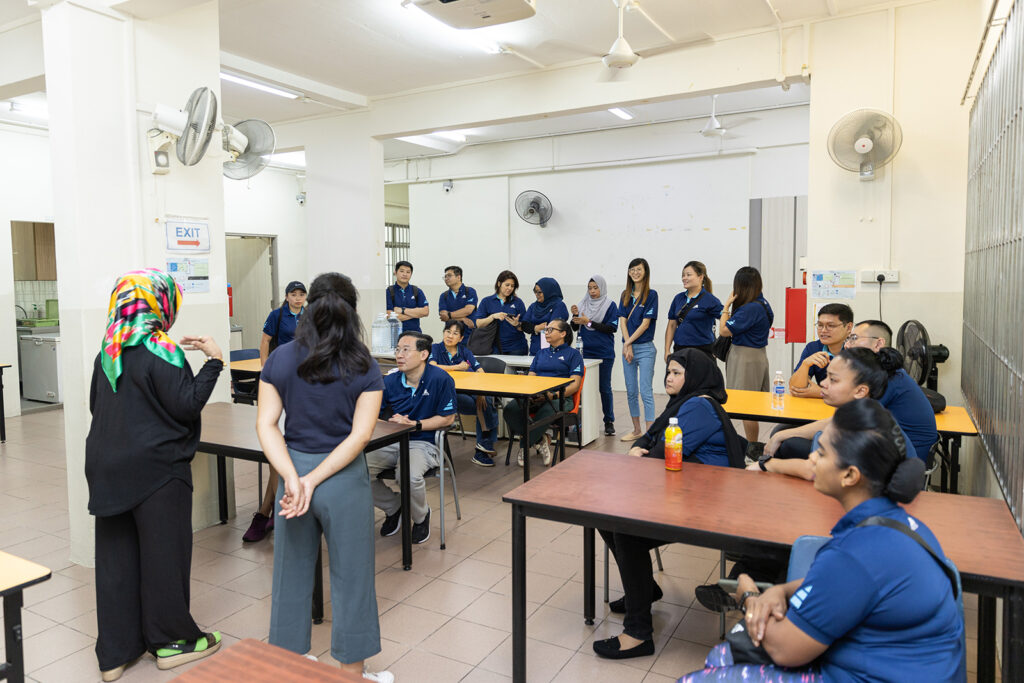 What Is Corporate Volunteering?: How and Why Singapore Companies Can Grow By Giving Back 2 aetos staff at a minds volunteer briefing through project v