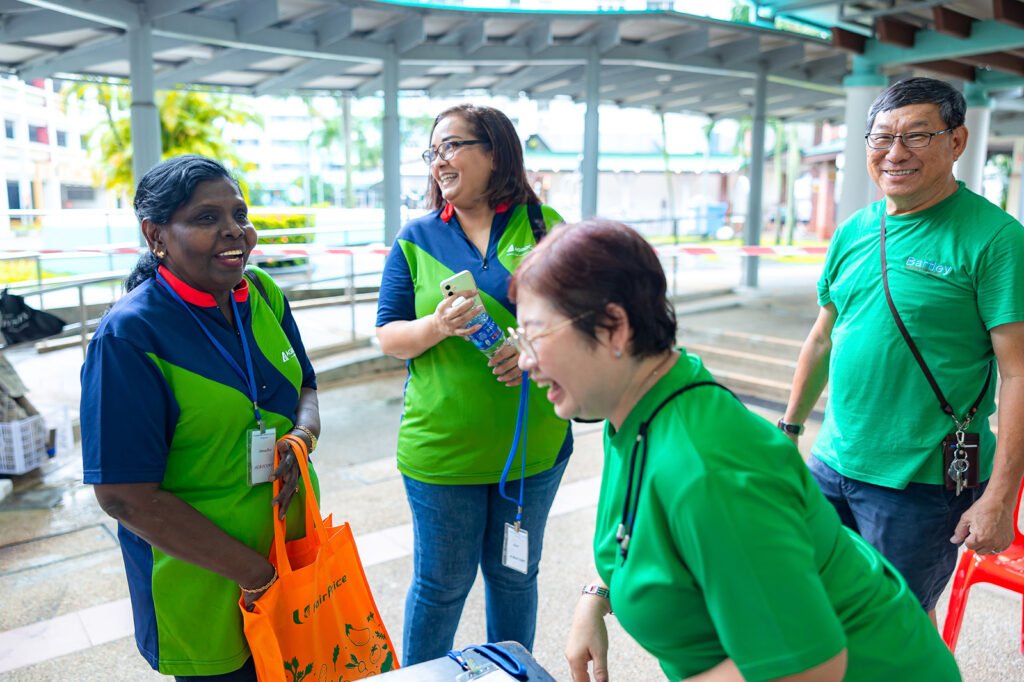 What Is Corporate Volunteering?: How and Why Singapore Companies Can Grow By Giving Back 5 Project V volunteers from Agrocorp International with staff from Bartley Community Care Services (BCCS)