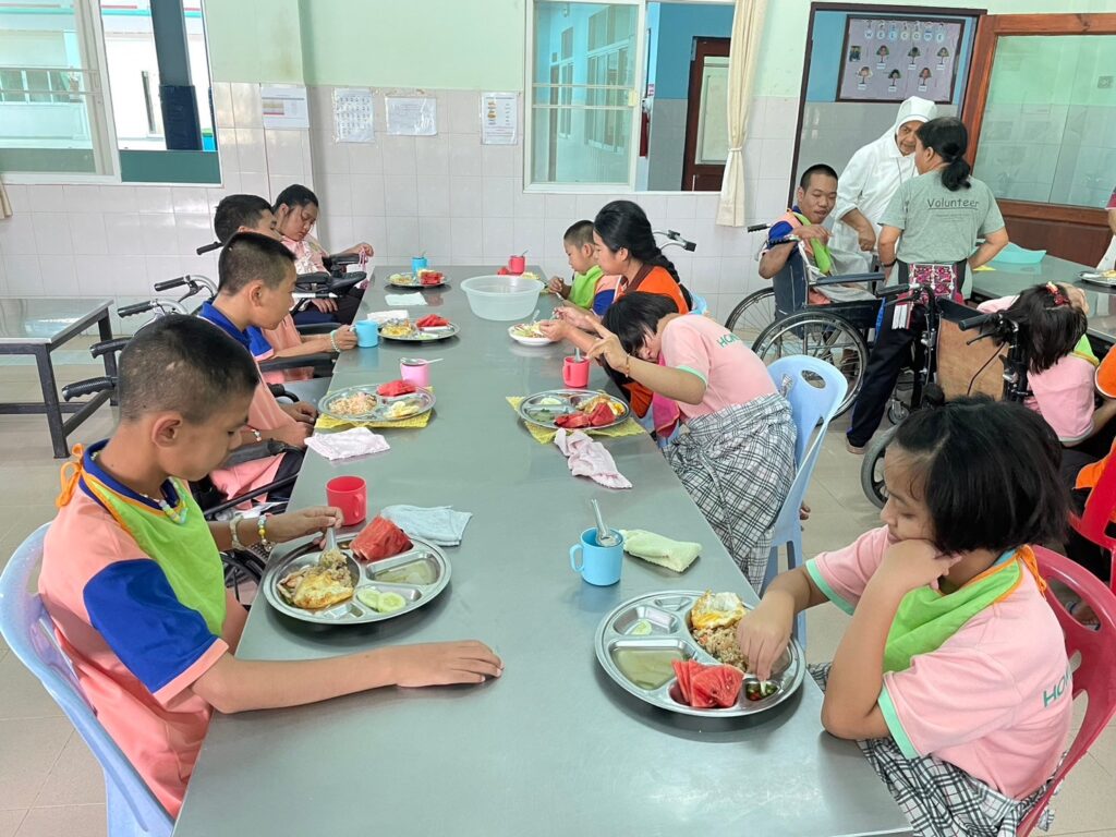 Children at the Camillian Social Centre in Chiang Rai having a meal that supports their health and learning. 