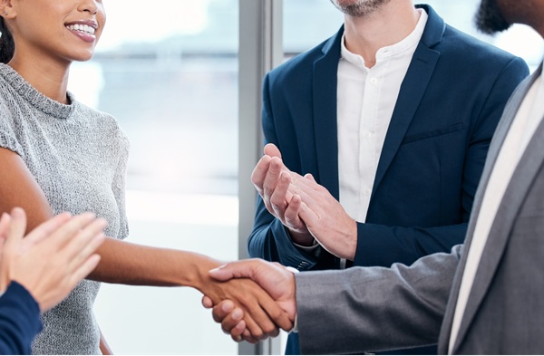 two people shaking hands