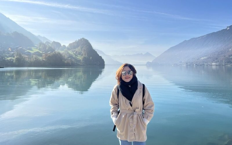 a woman posting for a photo in Iseltwald